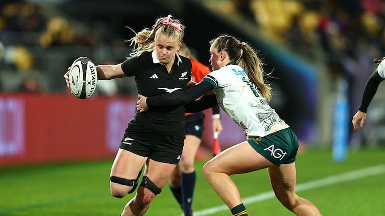 Jorja Miller attempts to go around the Australia Wallaroos defence.   