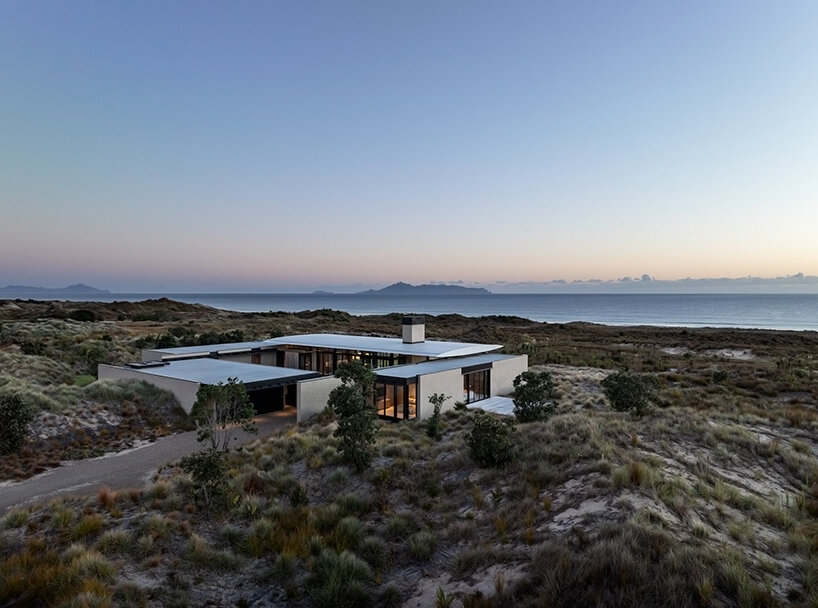 olson kundig frames new zealand coastline with modern beach house 'te whare tupu kirikiri'