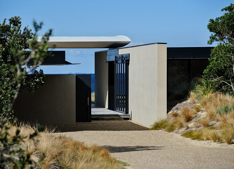 olson kundig frames new zealand coastline with modern beach house 'te whare tupu kirikiri'