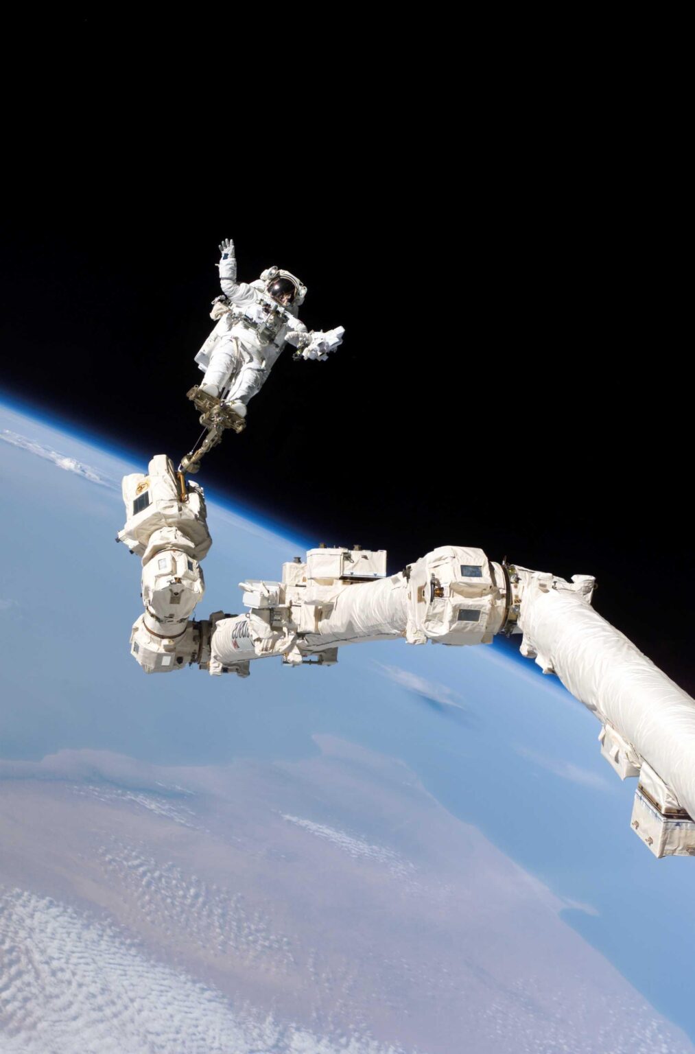 Astronaut Stephen Robinson during an extravehicular activity (EVA) on 3 August 2005.  NASA Image