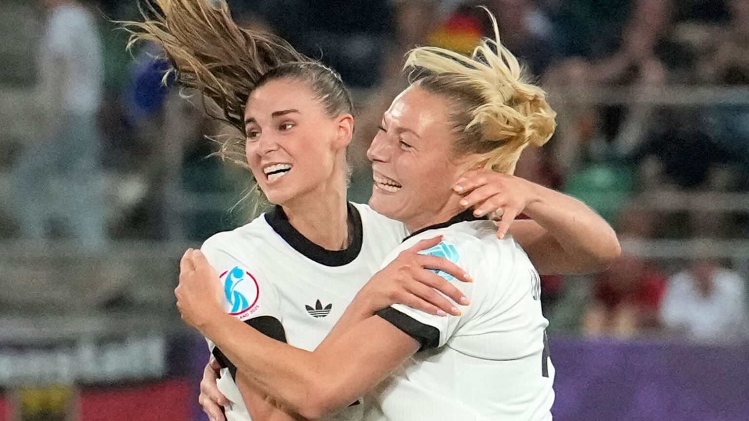 Germany Women 2-0 Poland Women: Lea Schuller, Jule Brand fire eight-time winners to first win at Euro 2025 | Football News Germany's Jule Brand, 2nd right, celebrates after scoring the opening goal during the Euro 2025, group C, soccer match between Germany and Poland at Arena St. Gallen in St. Gallen, Switzerland, Friday, July 4, 2025. (AP Photo/Martin Meissner)