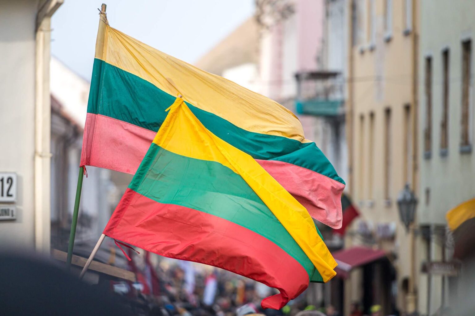 Is it true that in Lithuania you can get a fine for not flying the national flag on certain holidays? Should regular people follow this law?