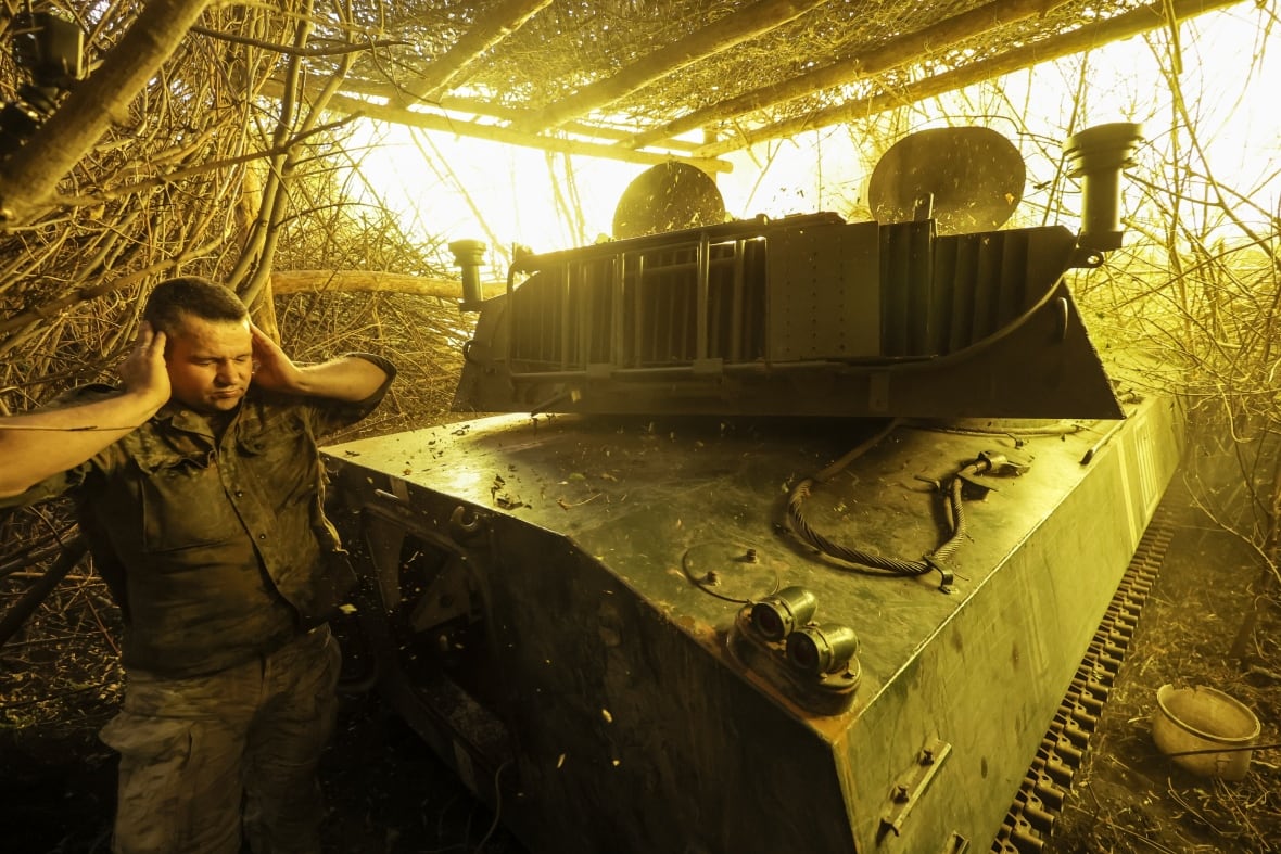 A handout photo shows a Ukrainian howitzer being fired near Chasiv Yar, in Ukraine's Donetsk region.
