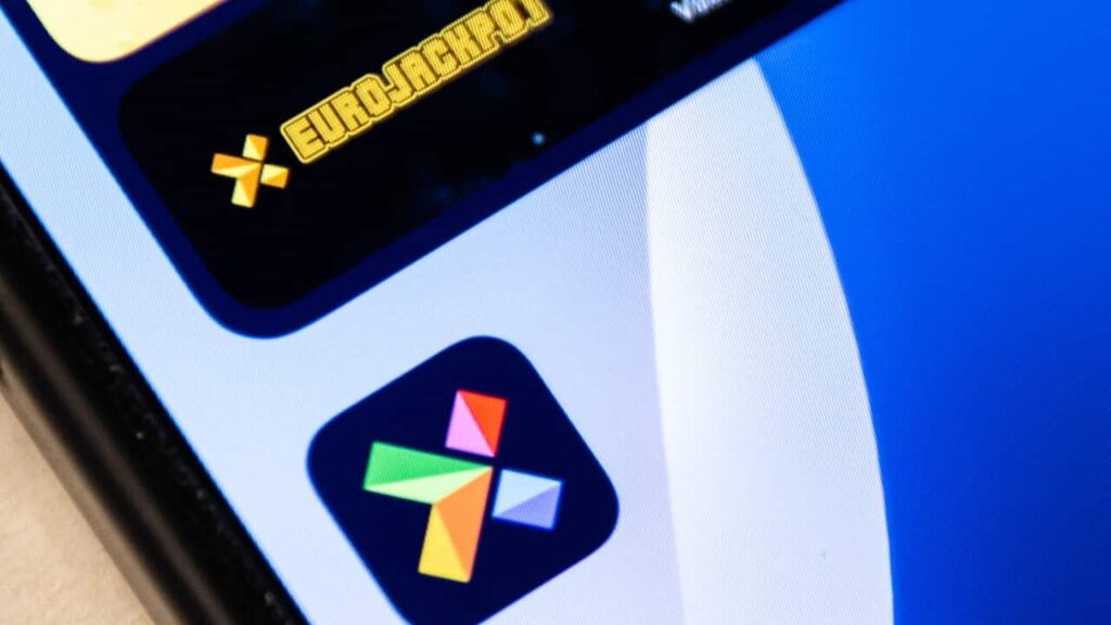 Thousands in Norway told they won huge sums in lottery error The colourful logo of the Norwegian lottery company Norsk Tipping is displayed alongside the Eurojackpot logo on a smartphone screen.