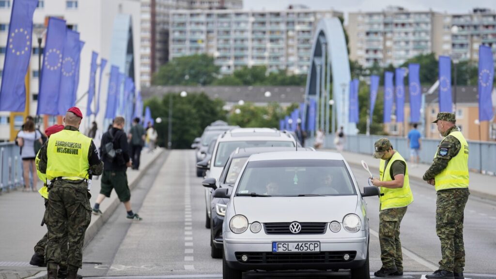 Poland reinstates border controls with Germany and Lithuania to discourage asylum-seekers