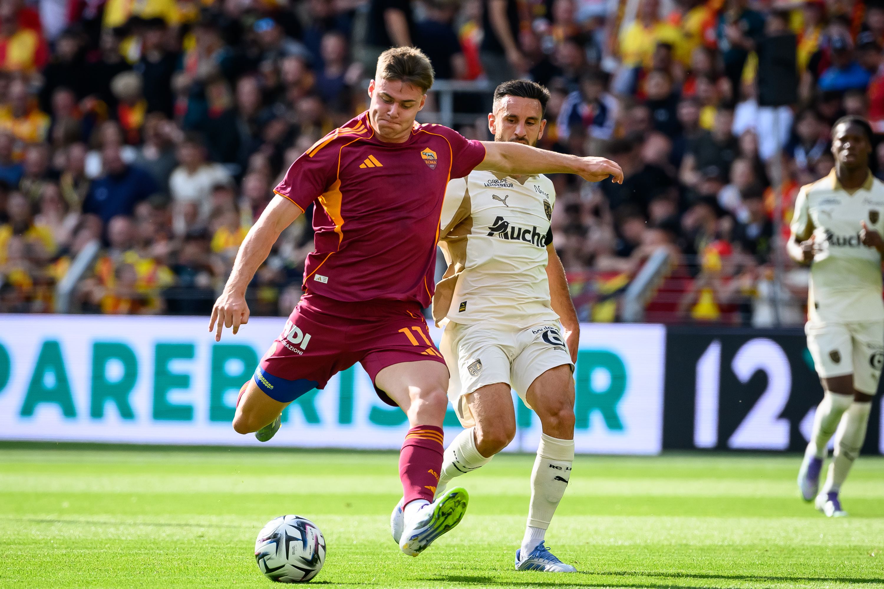 Evan Ferguson of AS Roma in action during a soccer match.