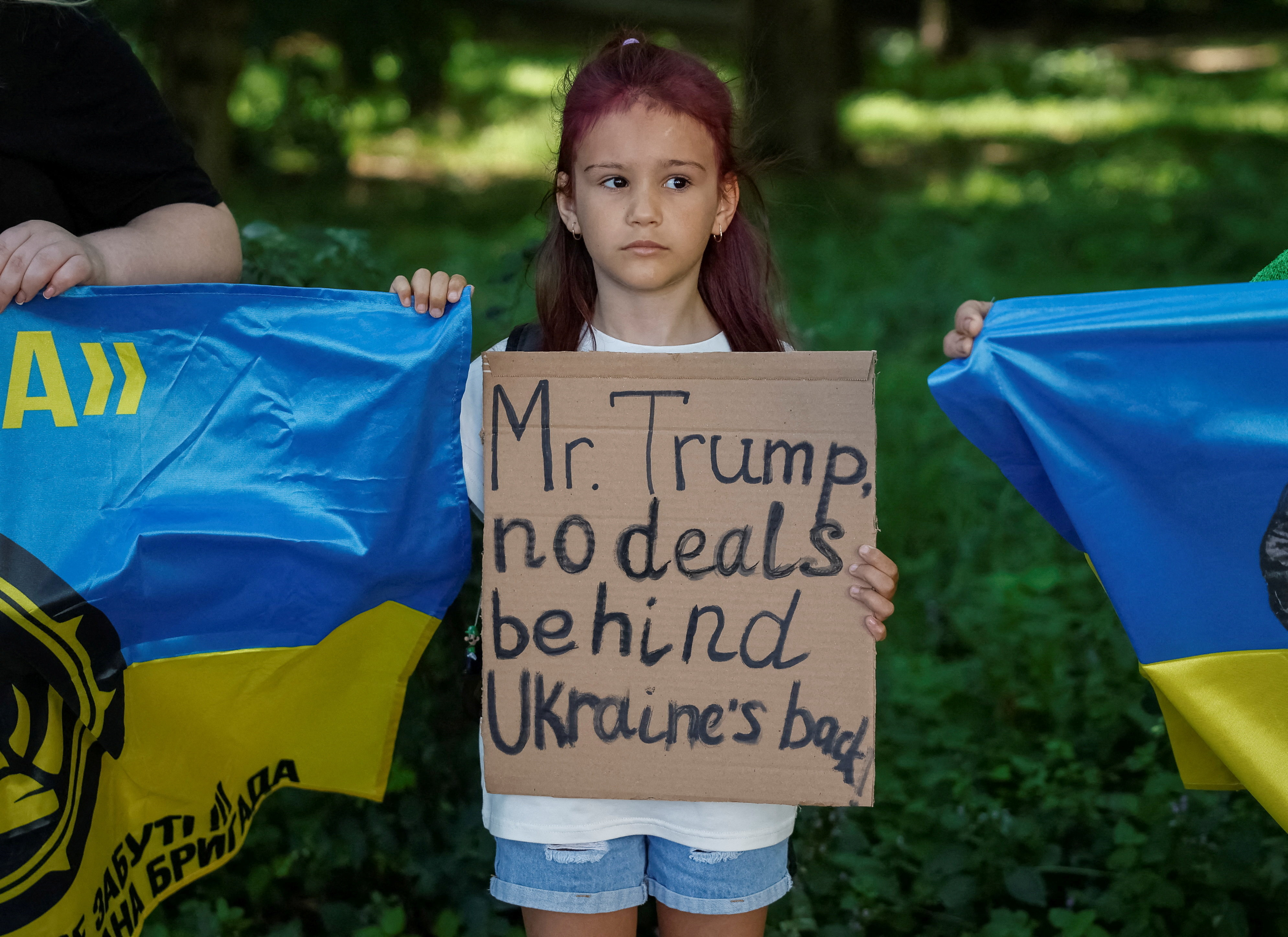 Demonstrators demand the release of thousands of prisoners of war held by Russia, as President Putin is set to attend the summit in Alaska on Friday