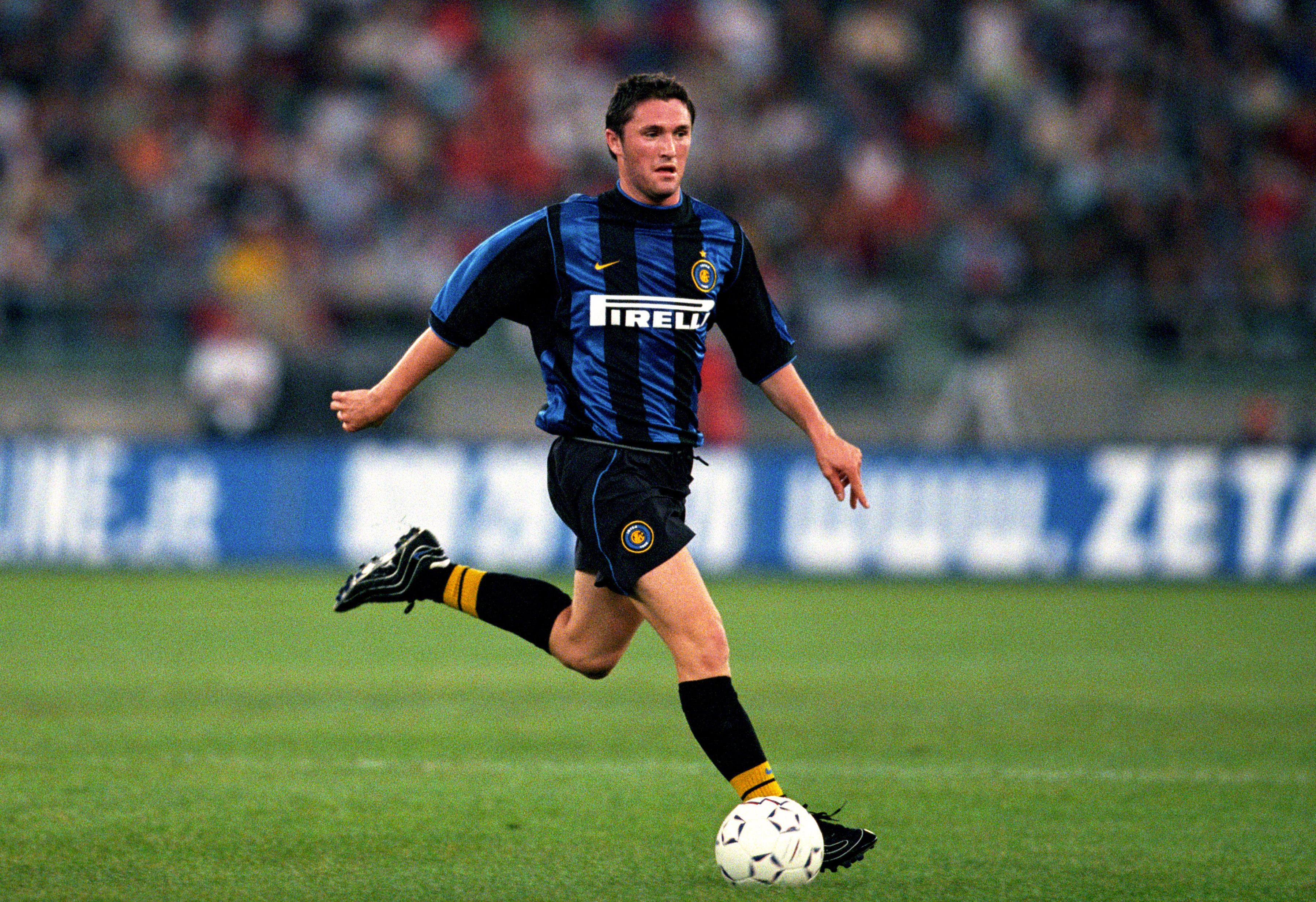 Soccer player dribbling the ball.