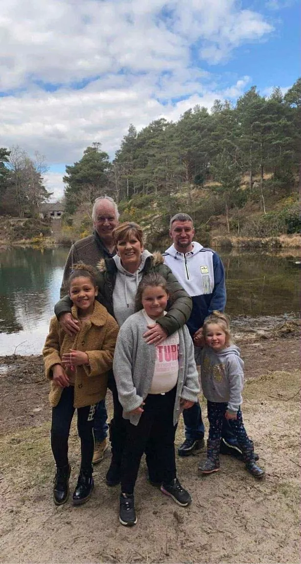 Alan with his family