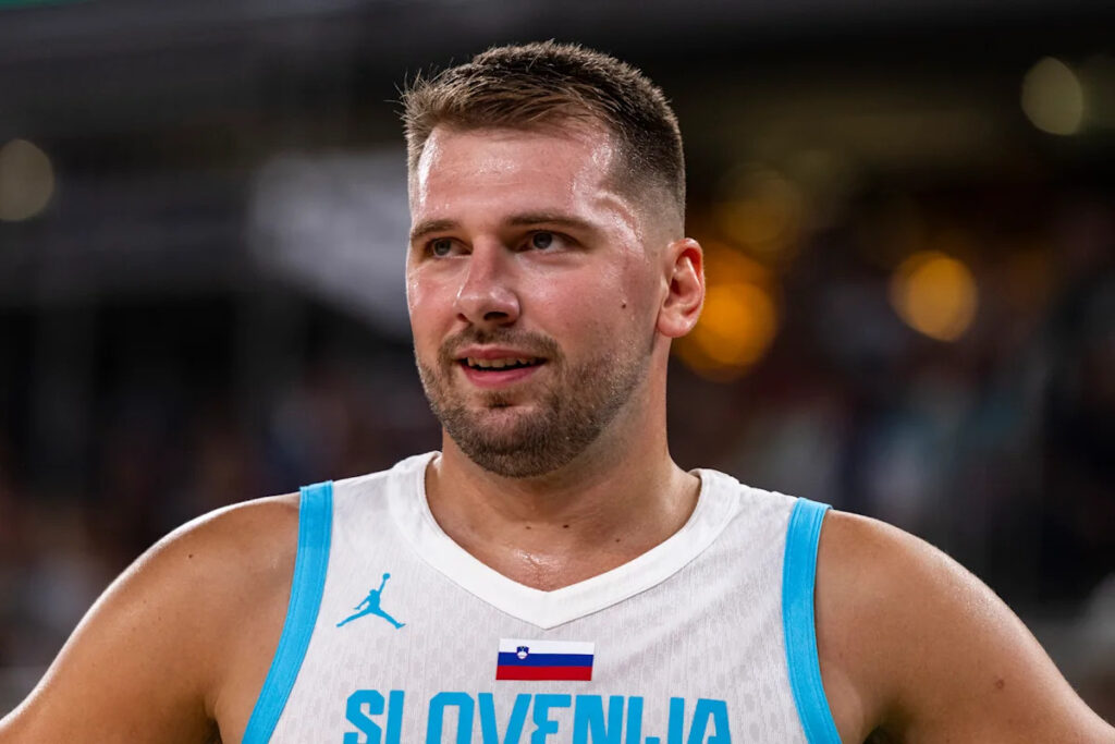 Luka Dončić reportedly cleared to play for Slovenia after worrisome knee collision in EuroBasket exhibition Download app from appStore