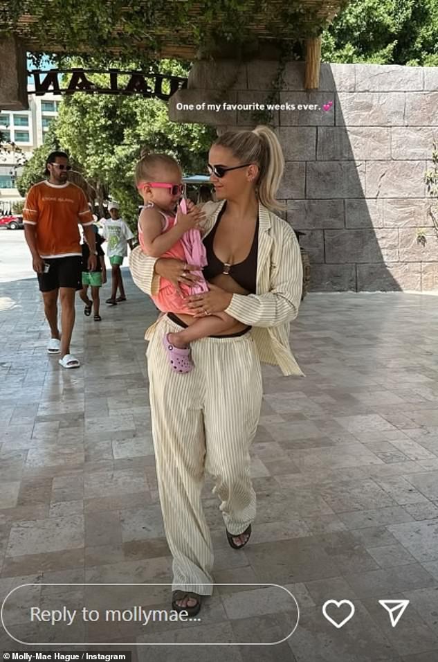 Molly-Mae Hague looked in good spirits as she enjoyed a family holiday to Turkey with her partner Tommy Fury and their daughter Bambi on Wednesday