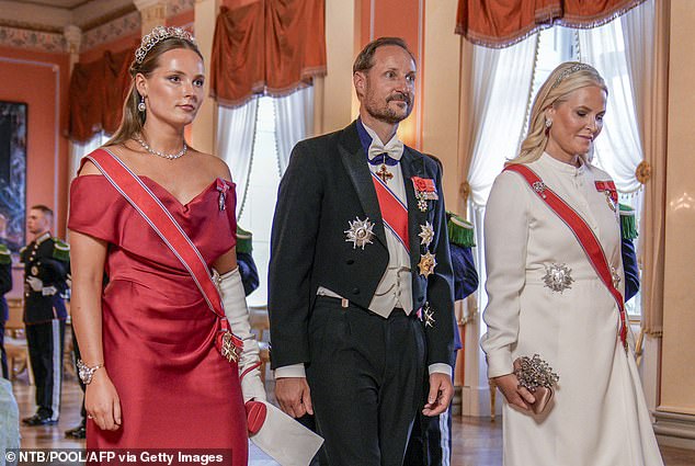 Before departing for Australia, Princess Ingrid Alexandra was pictured in full royal finery while attending a gala dinner with her parents at the Royal Palace in Oslo on June 23