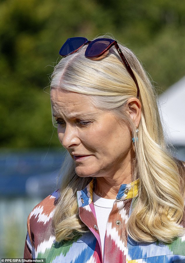 Crown Princess Mette-Marit of Norway was pictured looking strained today during an official engagement amid her son Marius Borg Høiby's legal woes