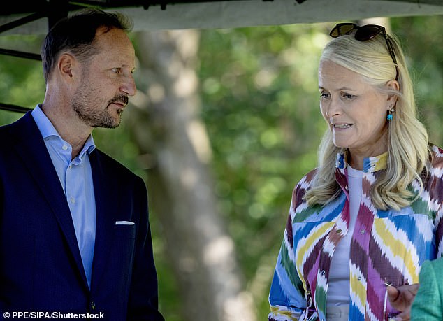 Crown Princess Mette-Marit and Crown Prince Haakon awaits an event for primary school pupils to mark the 100th anniversary of Gamlehaugen
