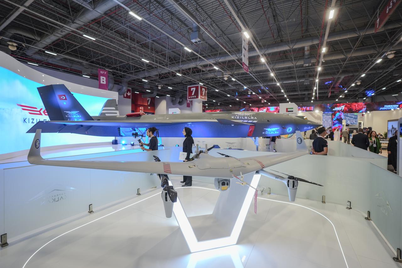 People visit the Baykar's stand with Bayraktar Kizilelma being displayed during IDEF 2025 in Istanbul, Türkiye on July 22, 2025. (AA Photo)