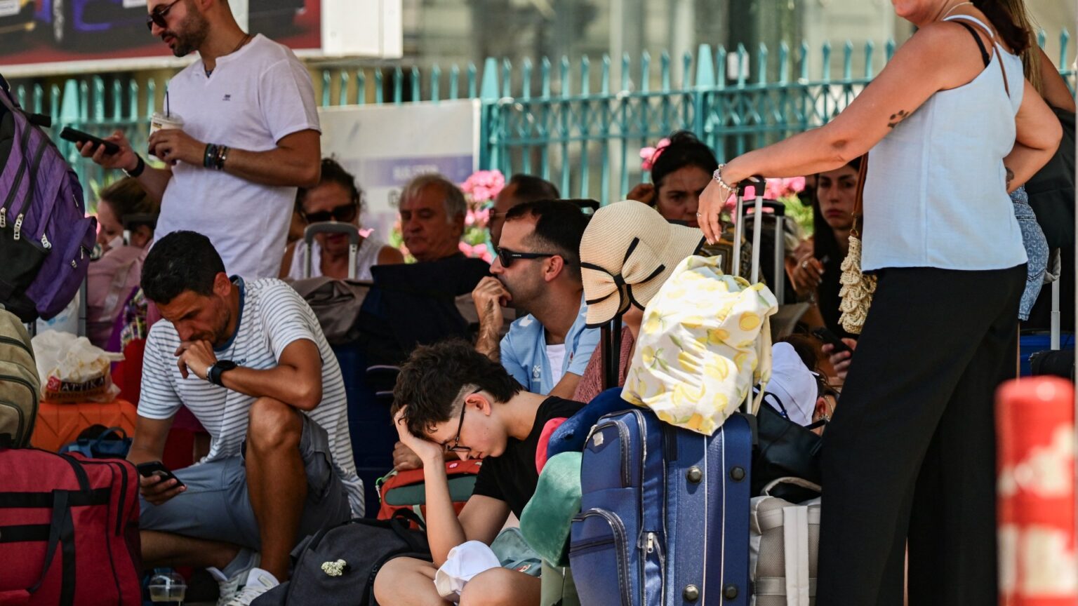 Holiday carnage with thousands left stranded & two dead after gale force winds batter Greece & shut down ferries