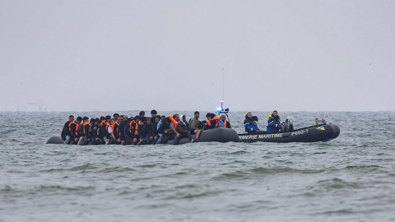 Three sisters, 9, 11 & 17, drown as 'dangerously overcrowded' migrant boat heading to Italy is battered by 5ft waves