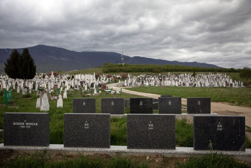  In a corner of the Bihać cemetery, several tombstones for migrants and people found dead near the border are marked with the letters “NN” (Maryam Ashrafi)