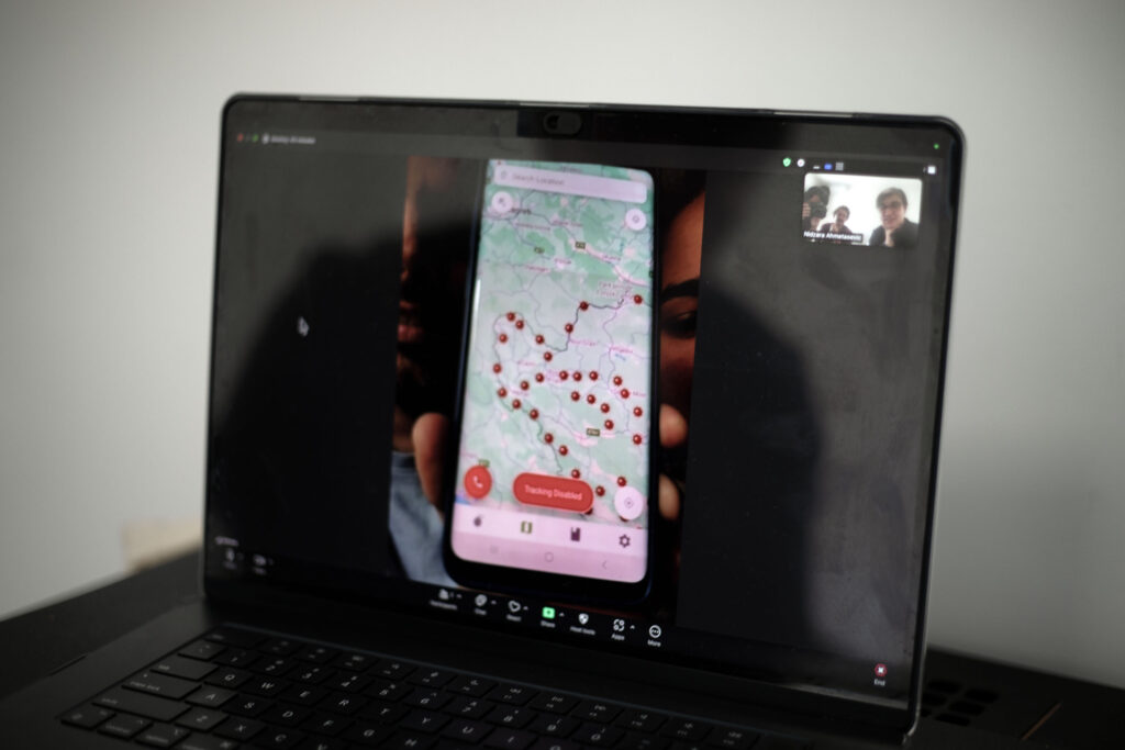 By video call, the Rodriguez family shows a screenshot of the route they took out of Bosnia, with the red dots marking mines (Maryam Ashrafi)