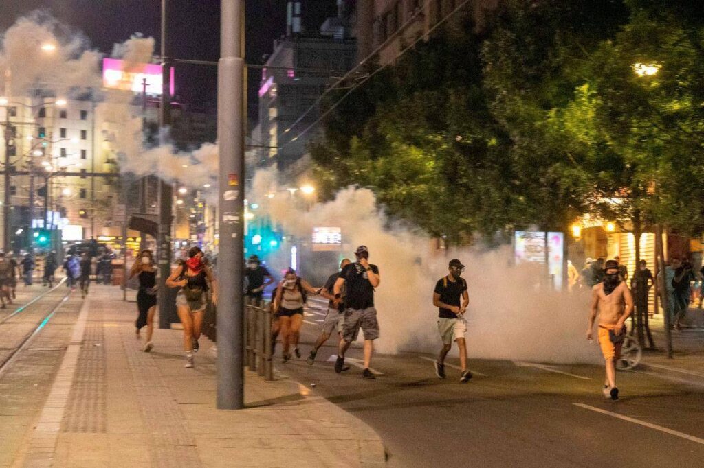 Serbia police use teargas as anti-government protests escalate