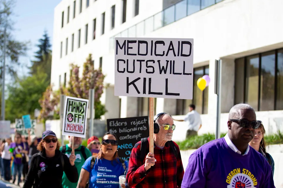 Community members march to the steps of the Oregon State Capitol to protest potential Medicaid cuts on Wednesday, April 16, 2025 in Salem, Ore.
