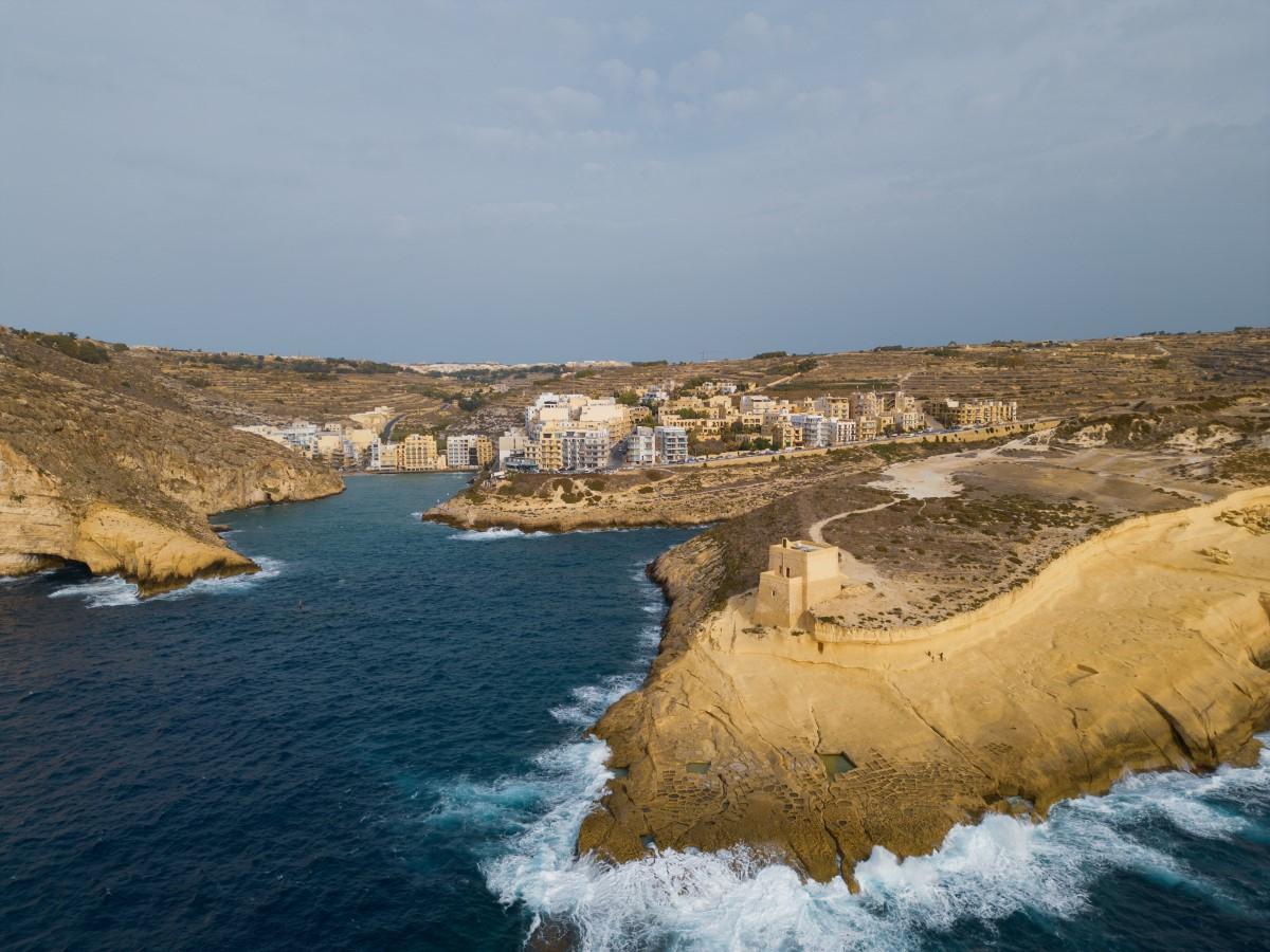 The Xlendi tower and town in the background. Photo: Shutterstock.com