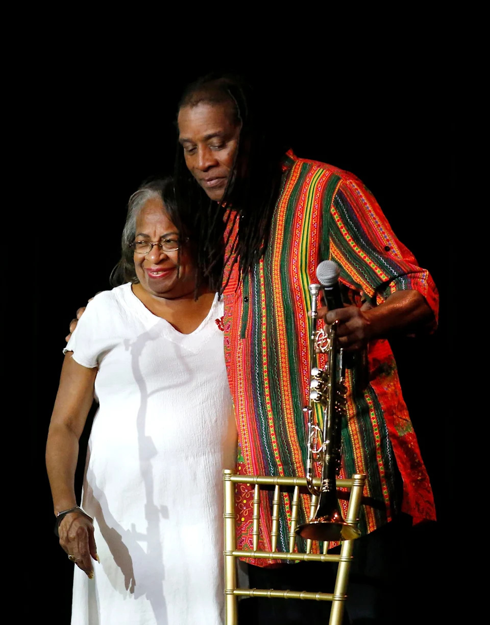 Hannibal Lokumbe embraces Marilyn Luper Hildreth during a 2022 jazz concert as part of the Freedom Fiesta celebration at the Yale Theater in Oklahoma City. Hildreth is the daughter of educator and civil rights leader Clara Luper.
