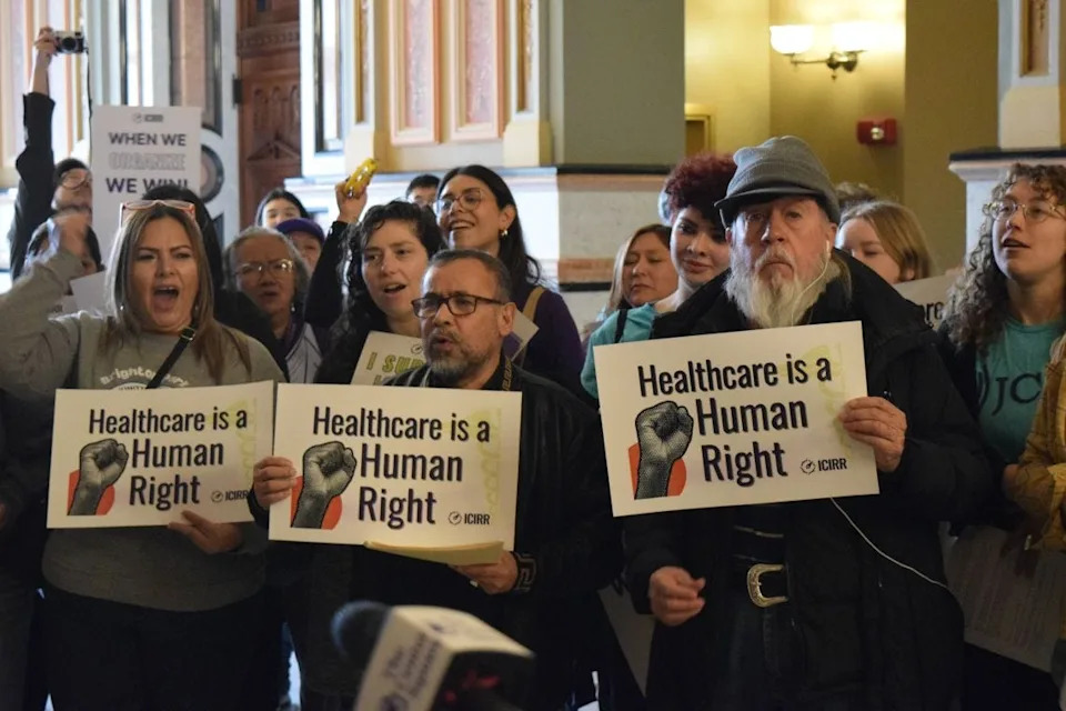 A crowd of about 100 people gathered in the Illinois Capitol on Wednesday, Feb. 26, 2025, for a rally urging state lawmakers to continue to support pro-immigrant policies, including Illinois’ programs for non-citizen health care, in addition to opposing the Trump administration’s executive orders on immigrations.
