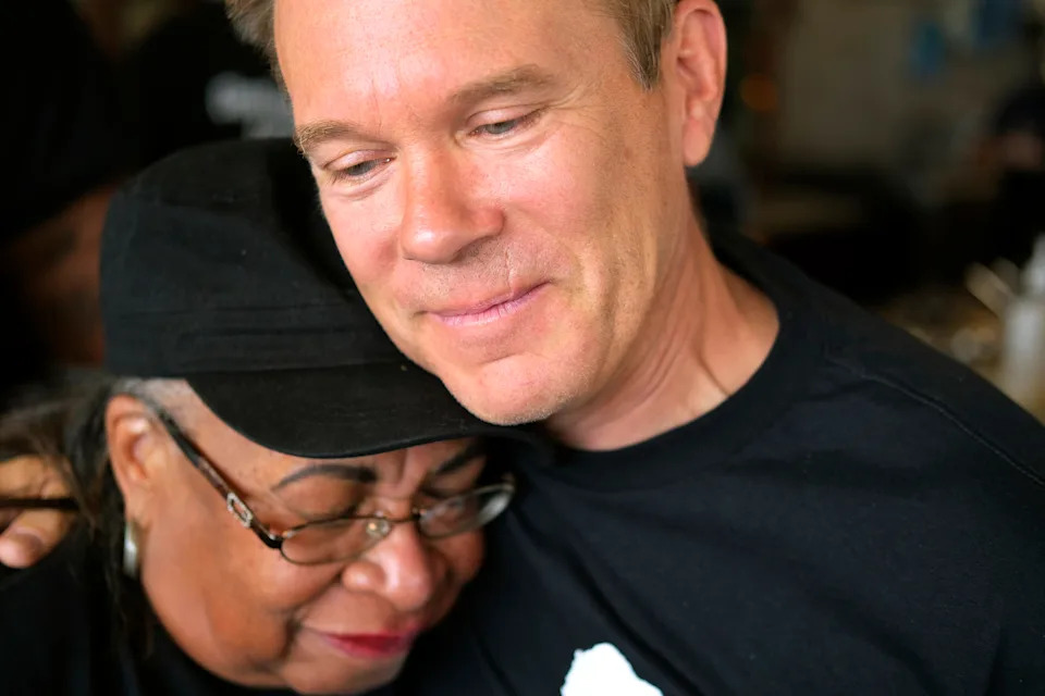 Music Director and composer of the OKC Philharmonic, Alexander Mickelthwate, hugs Marilyn Luper Hildreth in 2022 during the reenactment of the Oklahoma City sit-Ins.