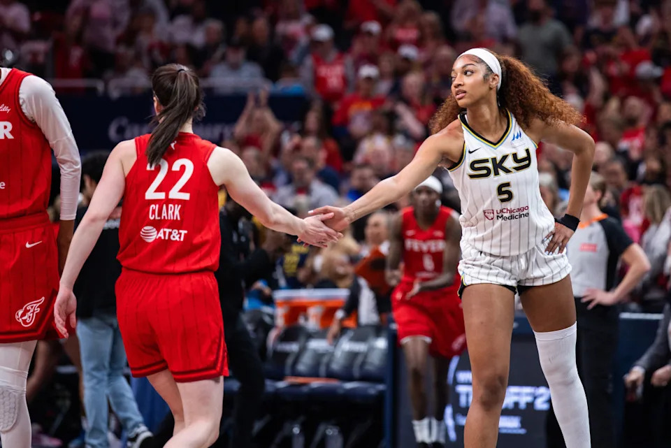 May 17, 2025; Indianapolis, Indiana, USA; Indiana Fever guard Caitlin Clark (22) and Chicago Sky forward Angel Reese (5) shake hands before the game at Gainbridge Fieldhouse. Mandatory Credit: Trevor Ruszkowski-Imagn Images© Trevor Ruszkowski-Imagn Images