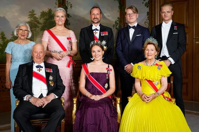 LISE ASERUD/NTB/AFP via Getty The Norwegian royal family, clockwise from top left: Marit Tjessem, Crown Princess Mette-Marit, Crown Prince Haakon, Prince Sverre Magnus, Marius Borg Hoiby, Queen Sonja, Princess Ingrid Alexandra, and King Harald