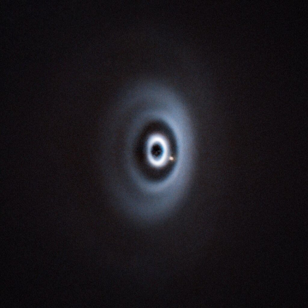 Discovery of the first ring-shaping embedded planet in a multi-ringed disk