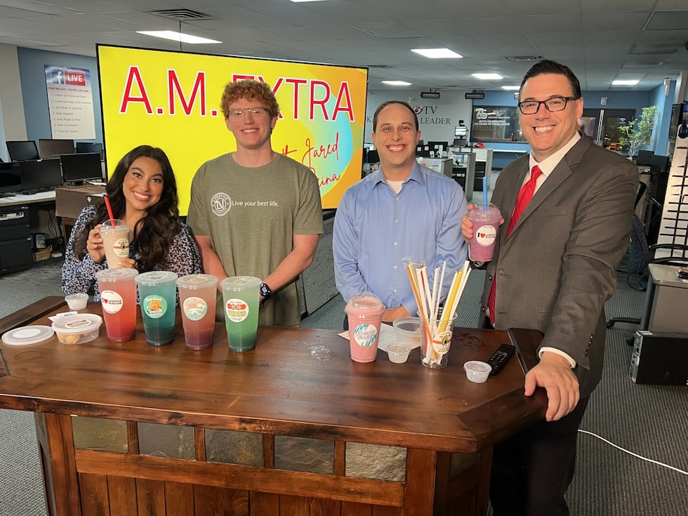 Reina Flores, Trevor Beckman, Doug Meyers and Jared Broyles sample teas and energy drinks from...