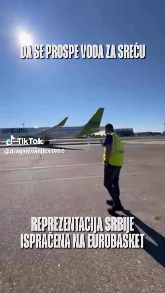 Worker Airport escorted basketball players for Eurobasket "ritual" pouring water for happiness