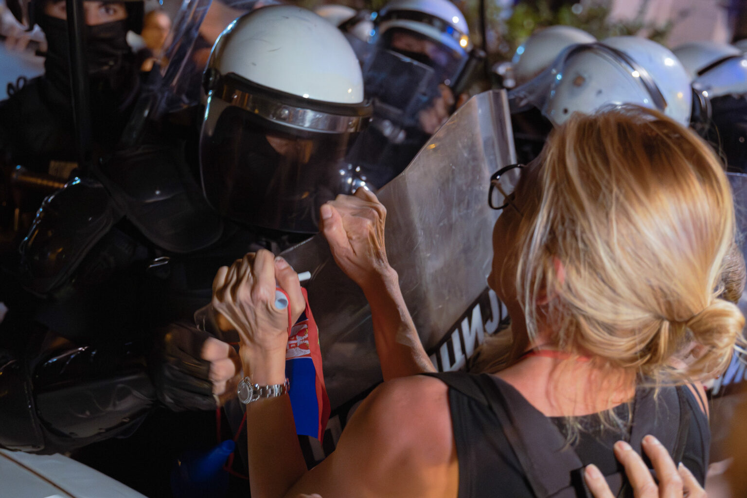 Serbian police allow masked goons to beat citizens