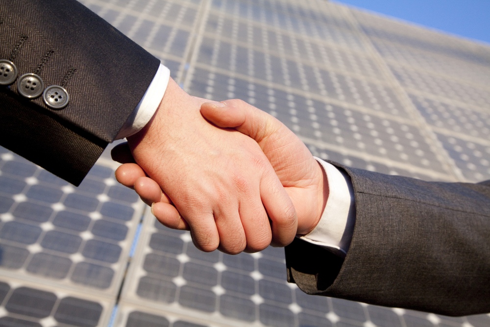 Solar deal handshake energy storage partnership