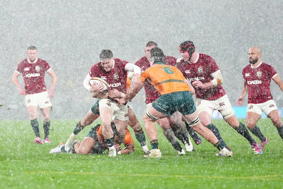 The game was played in heavy rain for periods (David Davies/PA Wire)