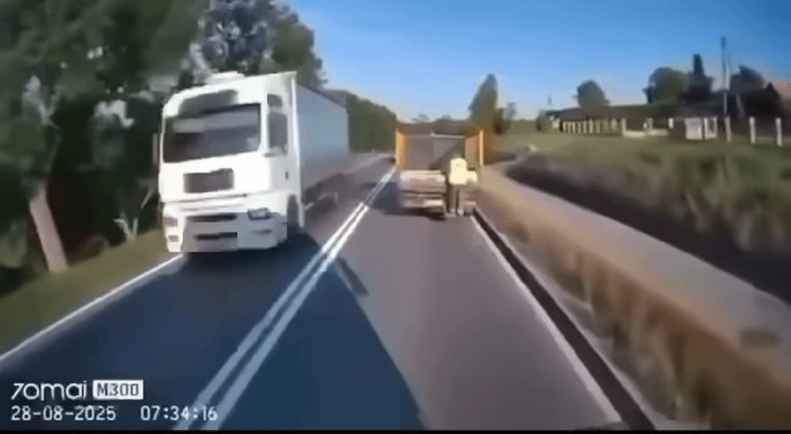 Car crashes head on with a garbage truck