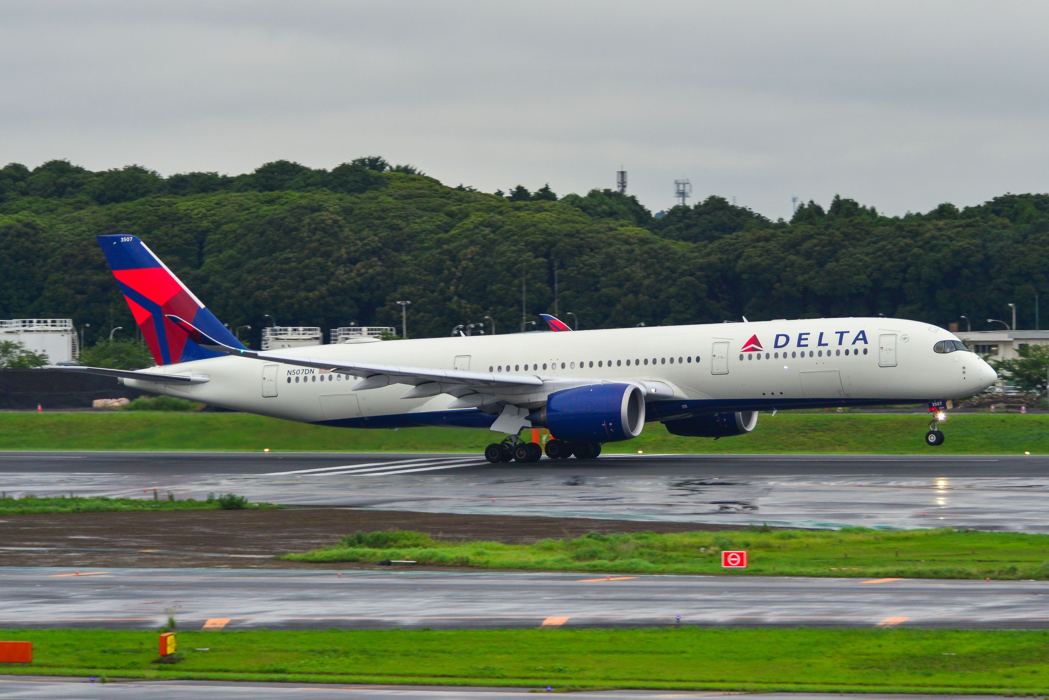Delta Air Lines Airbus A350-900 departing NRT shutterstock_1445291738
