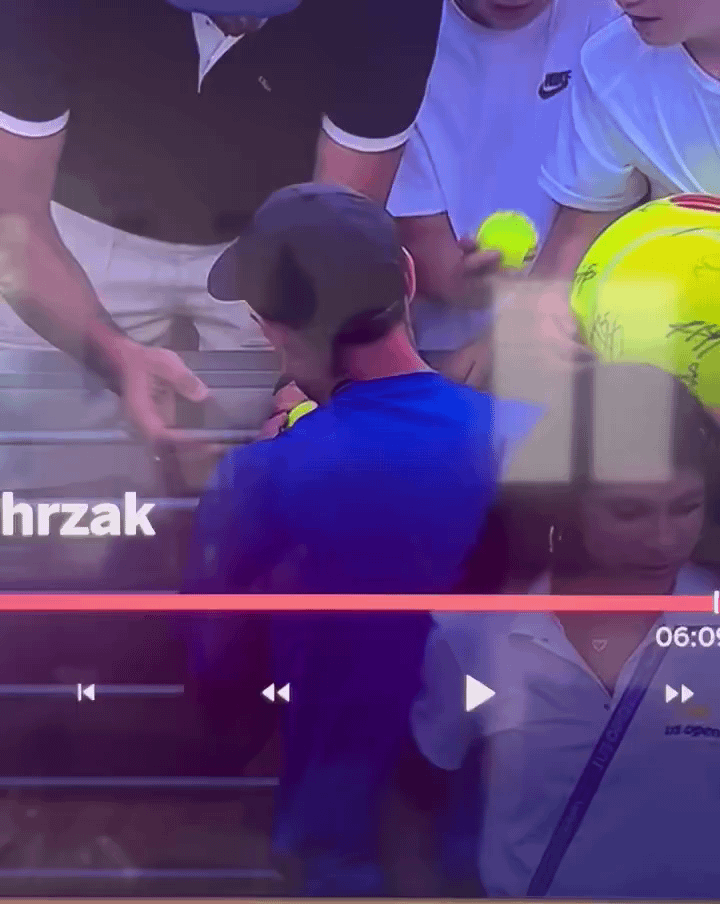 Kamil Majchrzak gives a hat to the kid and some asshole steals her with a smile on his face