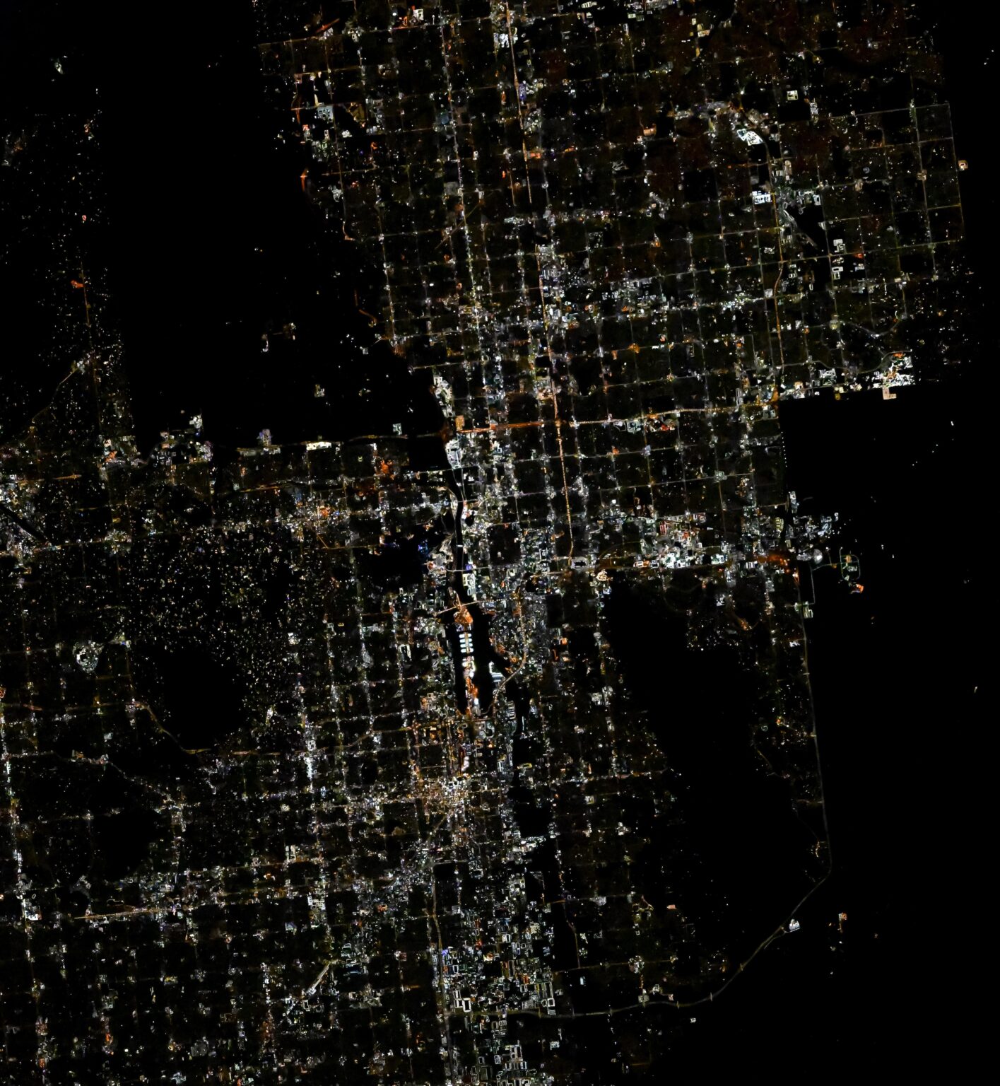 The grid city of Phoenix, Arizona photographed at night from the ISS. More details in comments!