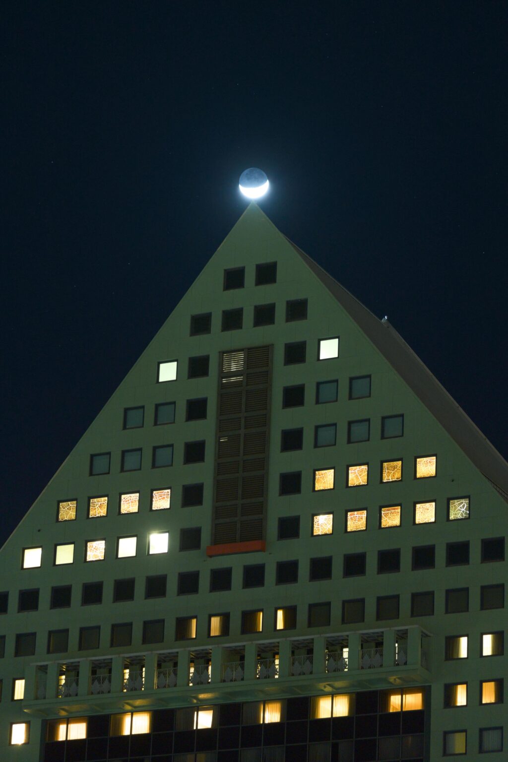 The crescent moon with earthshine, crowning the Dolphin Hotel