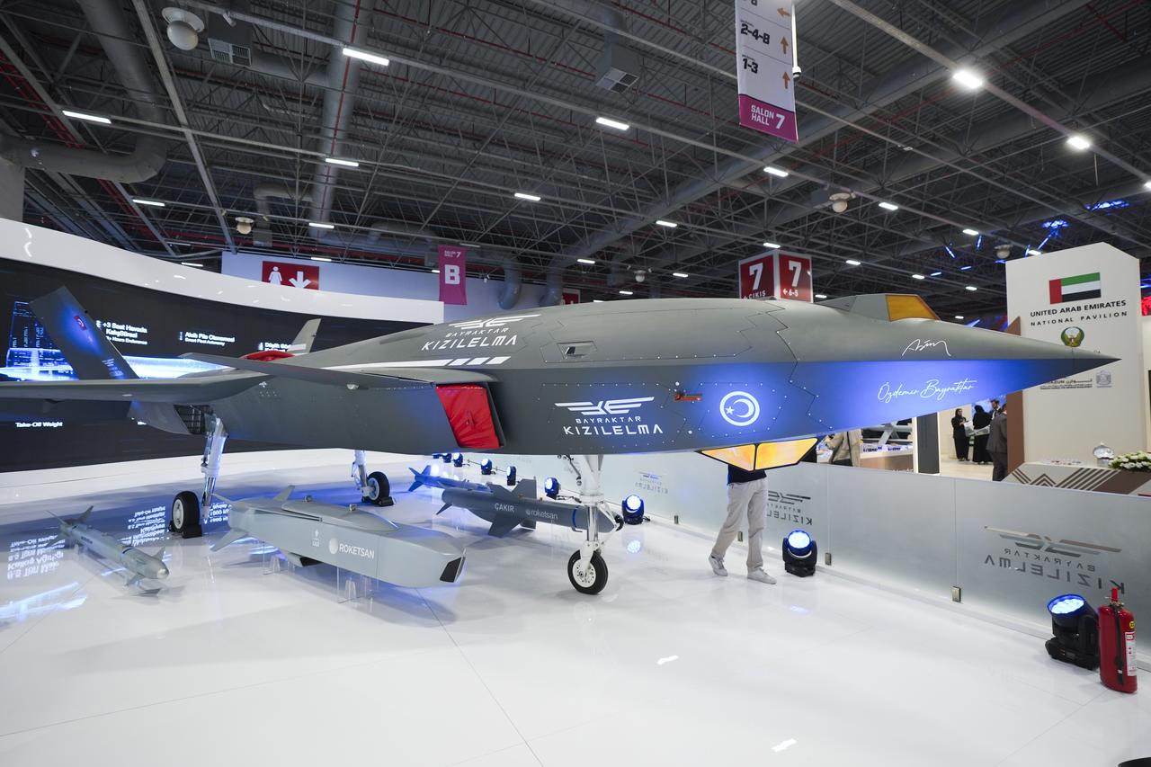 People visit the Baykar's stand with Bayraktar Kizilelma being displayed during IDEF 2025 in Istanbul, Türkiye on July 22, 2025. (AA Photo)