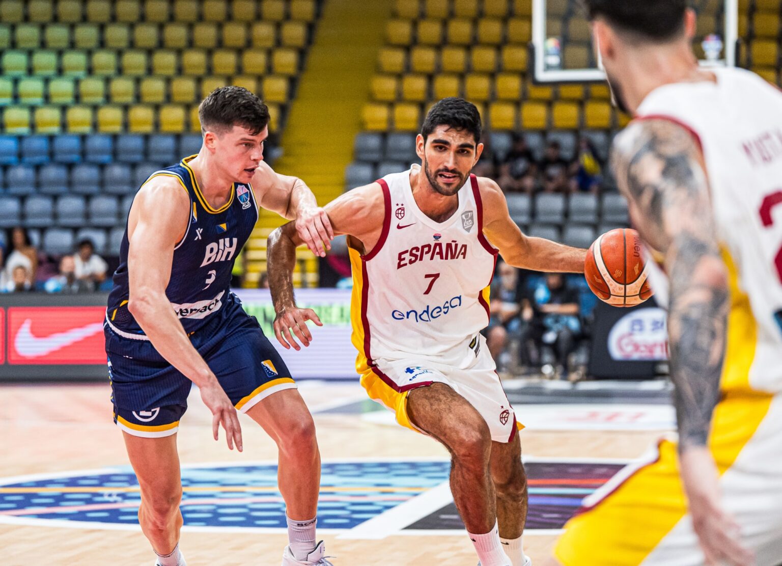 Reigning champs Spain bounce back with first victory