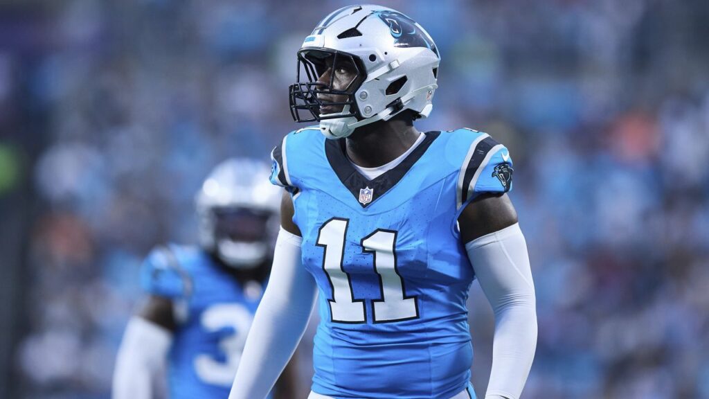 Carolina Panthers linebacker Nic Scourton (11) lines up on defense during an NFL preseason football game against the Cleveland Browns, Friday, Aug. 8, 2025, in Charlotte, N.C. (AP Photo/Brian Westerholt)