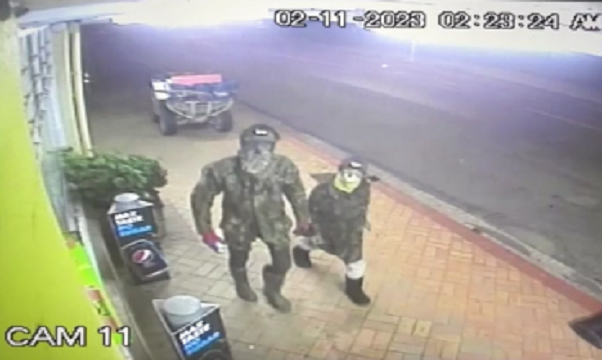 File: The pair pictured, believed to be Tom Phillips and one of his children, are thought to have then driven the quad bike south.CCTV shows the pair broke the front glass of a store in Piopio but fled north after the alarm was activated, around 2.10am on 2 November 2023