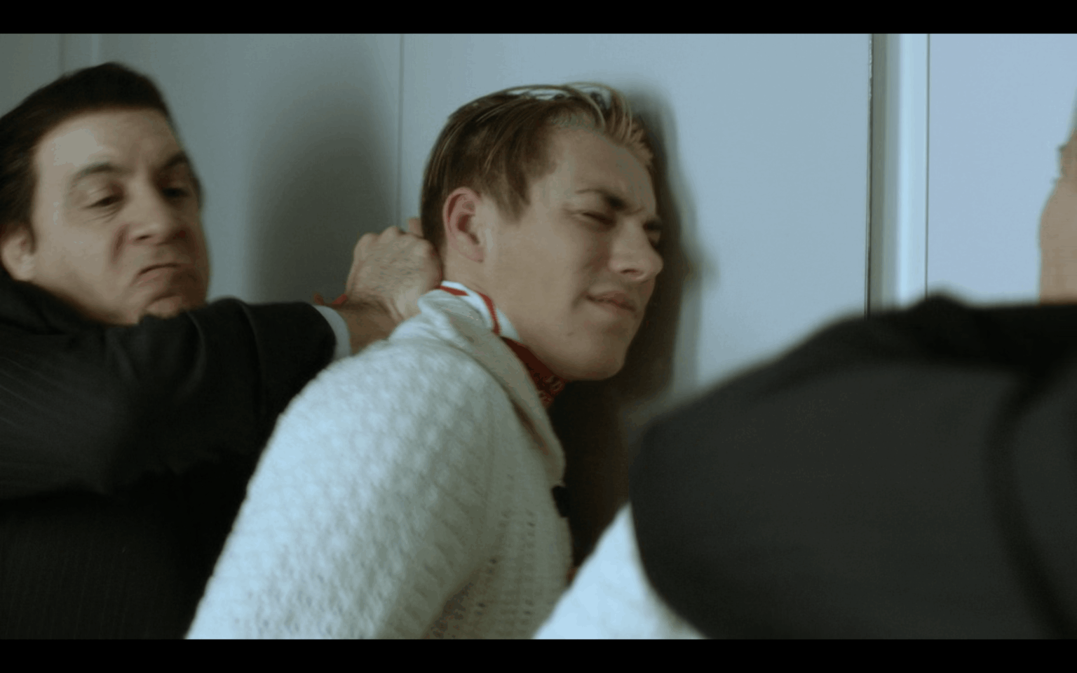 Asking here because ChatGPT apparently cannot identify TV series or actors. Does anyone know who the actor who's being beaten up here is?