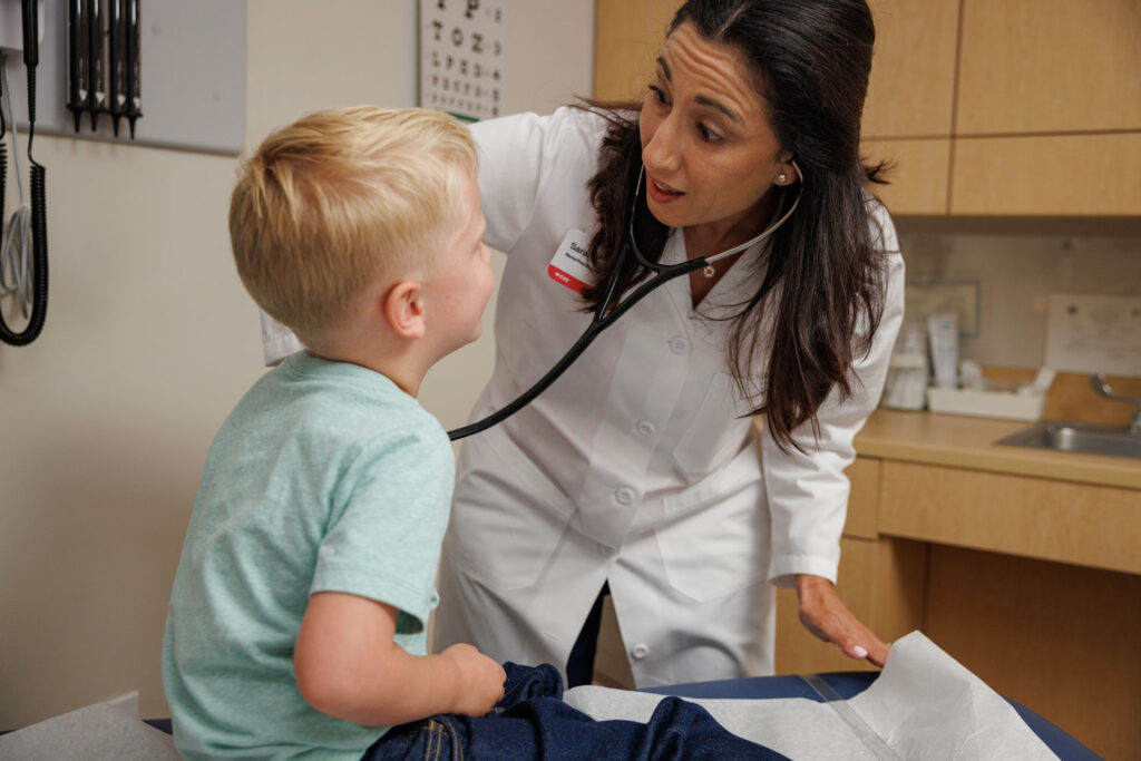 Practitioner working with a young patient