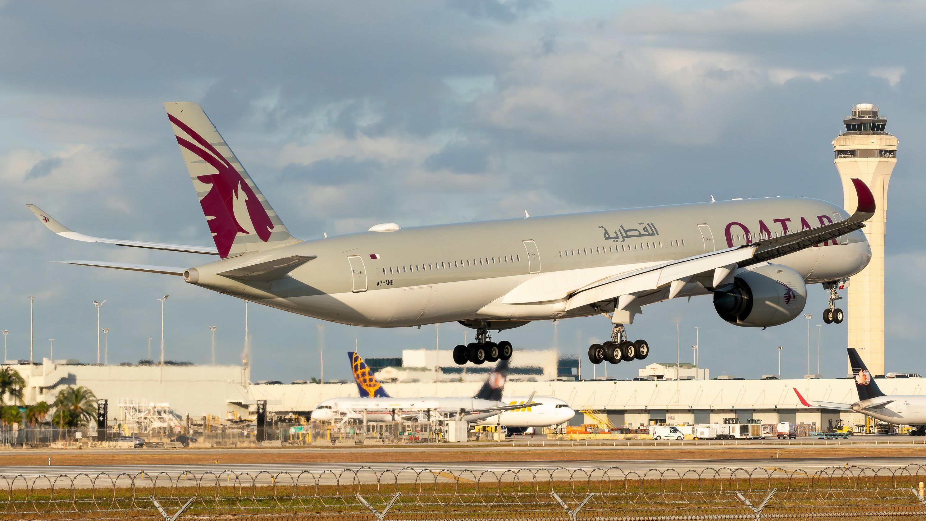 Qatar Airways A350-1000 about to land shutterstock_2579456155
