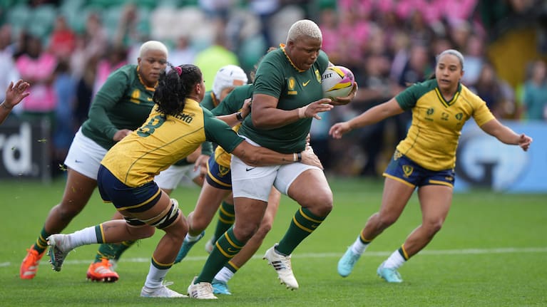 South Africa's Aseza Hele, right, is tackled by Brazil's Camilla Carvalho during the Women's Rugby World Cup 2025 Pool D match.